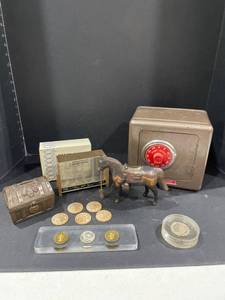 lot 4013 image: Coin banks, wooden nickels and more