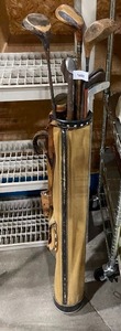 lot 4088 image: Vintage golf clubs in carrier