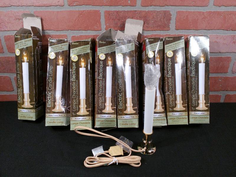 lot 55 image: Darice 6206 Electric Window Candles W Light Sensor