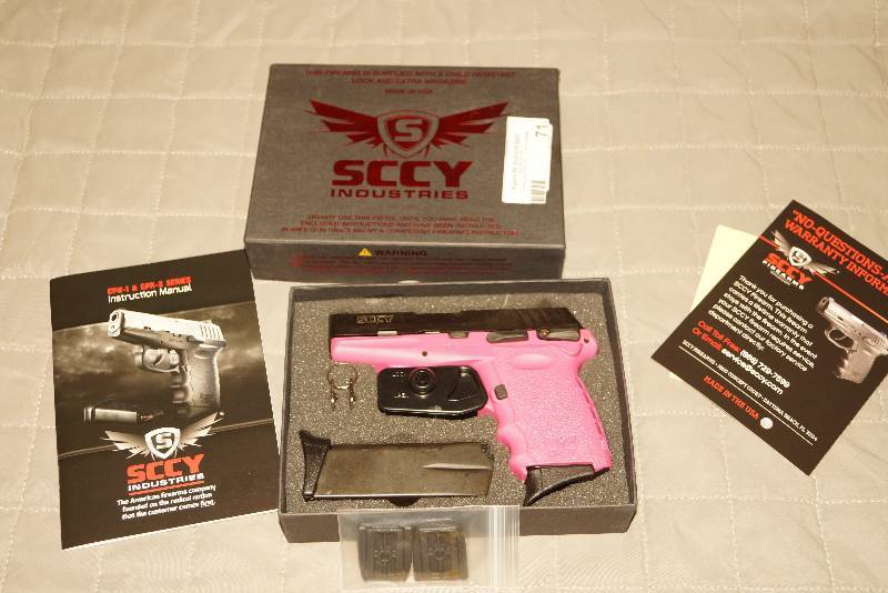 lot 71 image: NEW Pink 9mm Pistol With Case And Trigger Lock  SCCY Brand