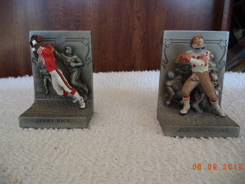 lot 1092 image: Jerry Rice and Joe Montana Metal Statue Figurines
