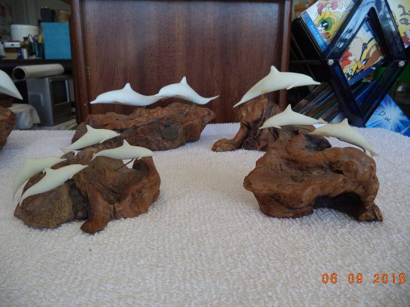 lot 1097 image: JOHN PERRY STUDIOS BURL WOOD SCULPTURE U.S.A.- Lot of 4- Dolphins