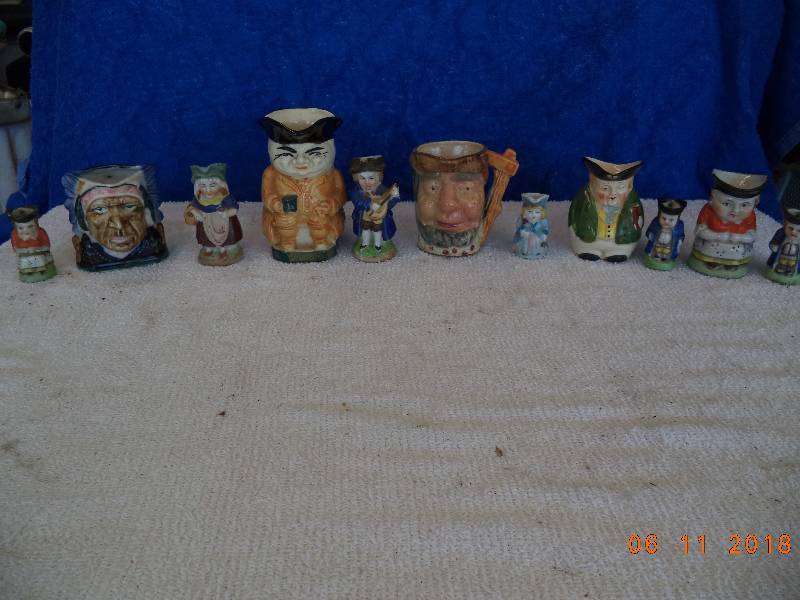 lot 1232 image: Lot of 11 Small Unique Pitchers-  People and Faces
