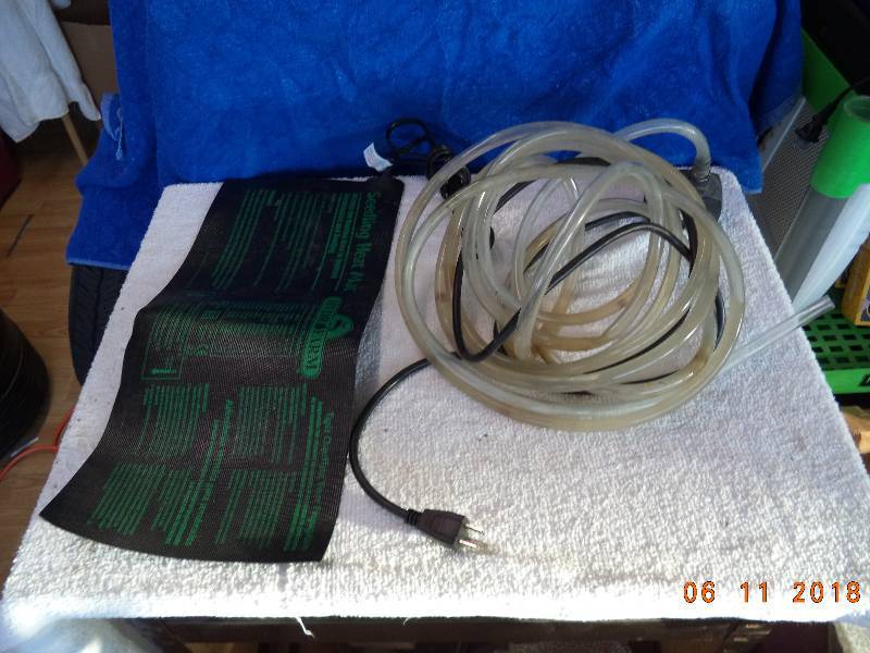 lot 2281 image: Seedling Heat Mat and Submergible Pump-  Growing.Gardening