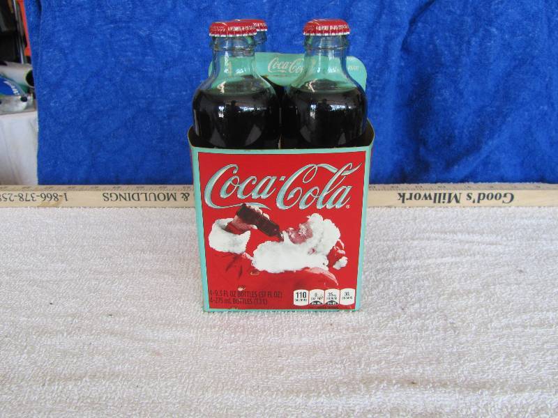 lot 564 image: Unopened 4 Pack of Coke- Bottles 125th Anniversary Collectors Item