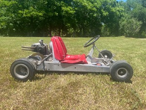 lot M109 image: This 1961 Rathmann Xterminator go-kart with Original McCulloch Engine included as well as a Power Bee 82050- Very Hard to Find