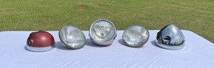 lot M114 image: Grouping of Headlights and Buckets  Lucas, Koito, Triumph