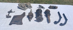 lot M123 image: Assorted Lot of Matchless Parts  Transmission Gears, Foot Pegs, Brackets, Covers