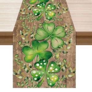 lot 18290 image: BOTB LIHM St. Patricks Day Wood Grain Green Shamrocks Clovers Eucalyptus Leaves Table Runner Burlap Table Decoration for Home Kitchen Dining Dinner Indoor Holiday Farmhouse Decor 13x108 Inch