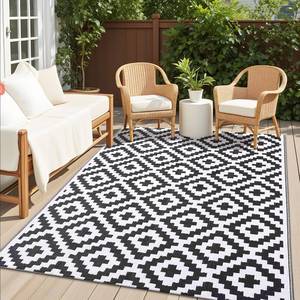 lot 7557 image: OLANLY Waterproof Outdoor Rug 5x8 ft, Outdoor Plastic Straw Rug for Camping, RV Mat Outside, Indoor Outdoor Carpet for Porch, Deck, Backyard, Balcony, Picnic, Black & White