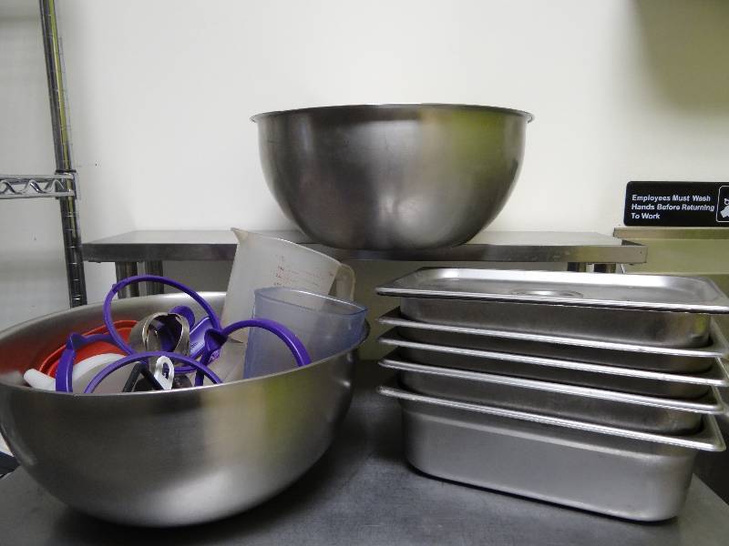 lot 6344 image: 2 Large Stainless Bowls with Kitchen Utensils and 5 Stainless Prep Pans, 1Lid