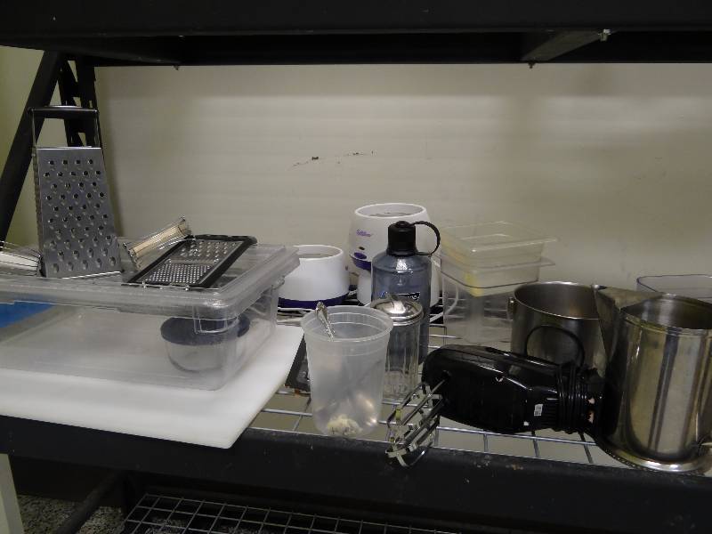 lot 6354 image: All Kitchen Utensils On Shelf