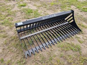 lot 7751 image: Unused Skid Steer Rock Bucket 66
