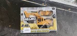 lot 7930 image: Excavator 8-Chann el Remote Control Toy