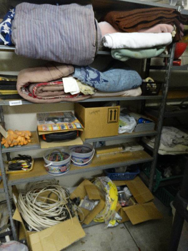 lot 465 image: Contents of shelf- shipping blankets coolers propane torch sand paper misc.