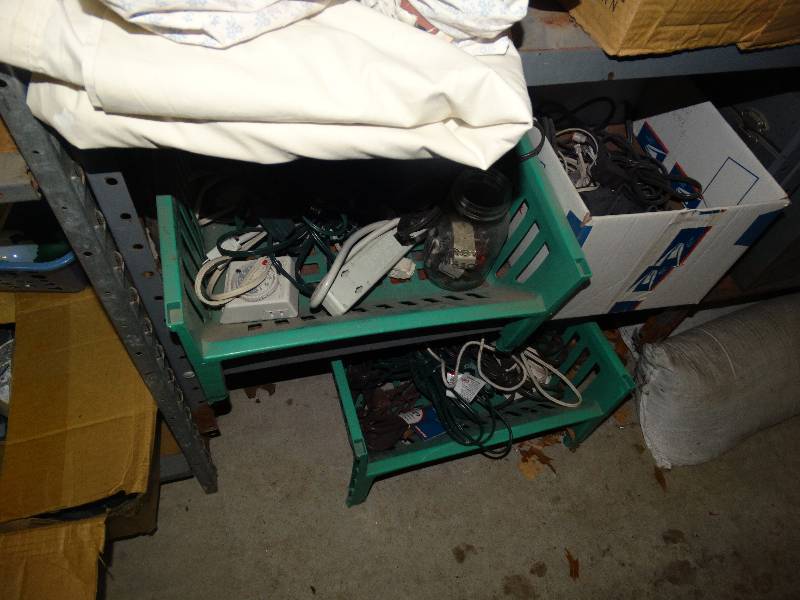 lot 466 image: Contents of shelf- hand spreader drill bits paddle bits cordsmisc.