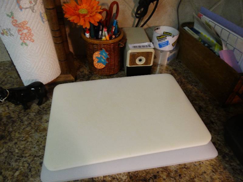 lot 112 image: Paper towel holder various office supplies cutting boards