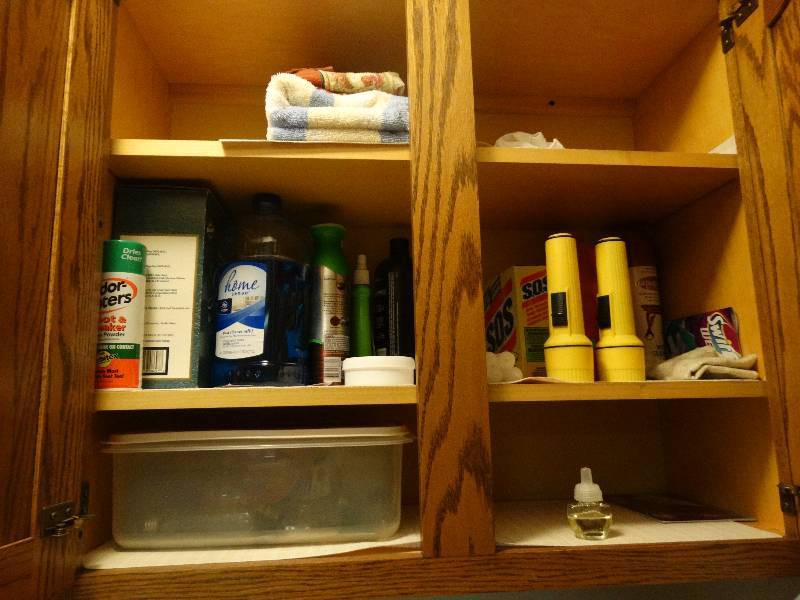 lot 130 image: Light bulbs flashlights cleaning suppliesironing board