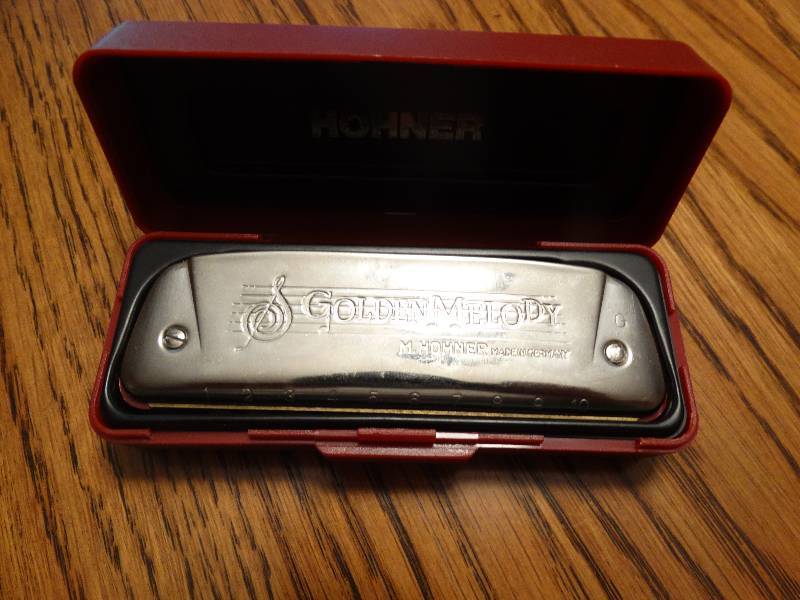lot 154 image: Hohner harmonica golden melody w case