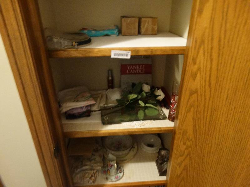 lot 205 image: Lot of various decor items in closet