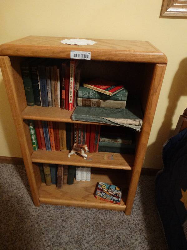 lot 329 image: Wood bookshelf w lot of antique & vintage books