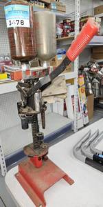 lot 3478 image: MEC Shotshell Reloading Press with Powder Bottles