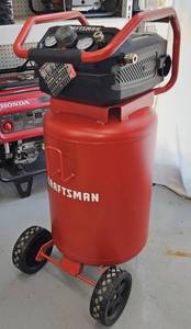 lot 3313 image: Unused - Craftsman 20 Gallon Air Compressor Model CMXECXA0232043 - 175 PSI max pressure, 4.0 CFM at 90 PSI. Features Oil Free Pump, 120V 60Hz 15A