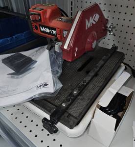 lot 3344 image: Appears Unused - MK Diamond MK-170 Tile Saw 5500 RPM 115V - 7 Diamond Blade & Submersible Water Pump Included