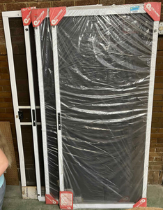 lot 3633 image: Lot of Four (4) Columbia Manufacturing Architectural Screen Door 78x36in White