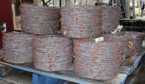 lot 3673 image: Lot of Seven (7) New 1320ft Rolls of Red Brand Hi-Tensile Barbed Wire 15.5 GA 4PT 5 Spacing ASTM A-121