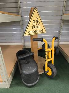 lot 9015 image: Lakeshore Yellow Tricycle with Trike Crossing Sign