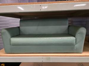 lot 9018 image: Sage Green Faux Leather Childrens Loveseat Sofa