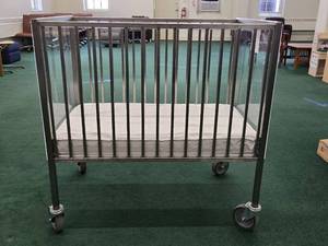 lot 9040 image: Stainless Steel Medical Crib with Mattress and Casters