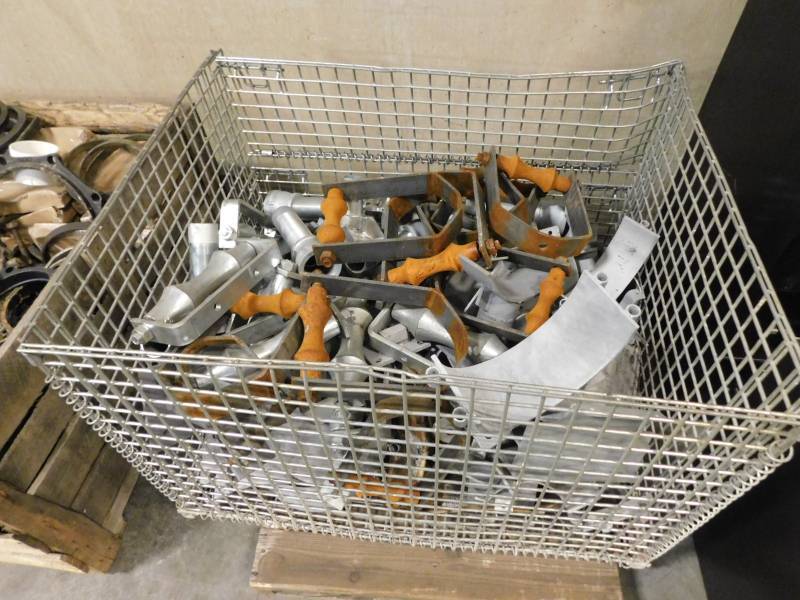 lot 1614 image: Large Lot of Pipe Hangers Misc Cage Pallet Included