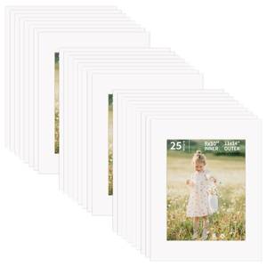 lot 15522 image: ZBEIVAN 11x14 White Picture Mats for 8x10 Pictures 25 Packs, Acid-Free White Core Bevel Cut Frame Mattes for Photos, Prints, Drawings, or Artworks