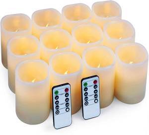 lot 5520 image: Hausware Flameless Candles Battery Operated Candles Set of 12 (D 3 x H 4) Real Wax Pillar Flickering Candles LED Flameless Candles with Remote and Timer Control (Ivory Color)