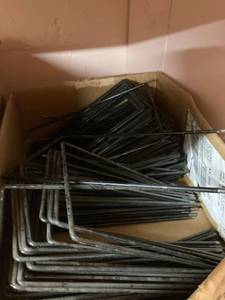 lot 7163 image: Smaller box of multiple gun holders