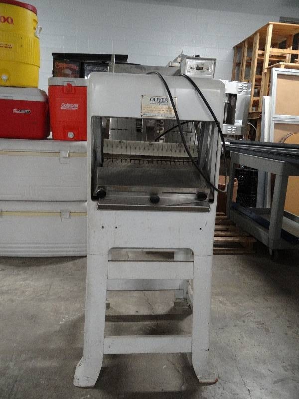lot 2219 image: Oliver Gravity Feed Bread Slicer Model # 797-32