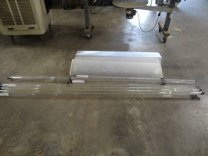 lot 2221 image: 8 and 4 Clear Tube Guard For Fluorescent Bulb and (4) White Light Covers