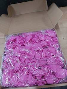 lot 1052 image: Box of decorative pink flower heads