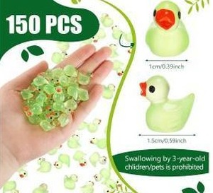 lot 14266 image: Tarpop Luminous Green Mini Duck Figurines