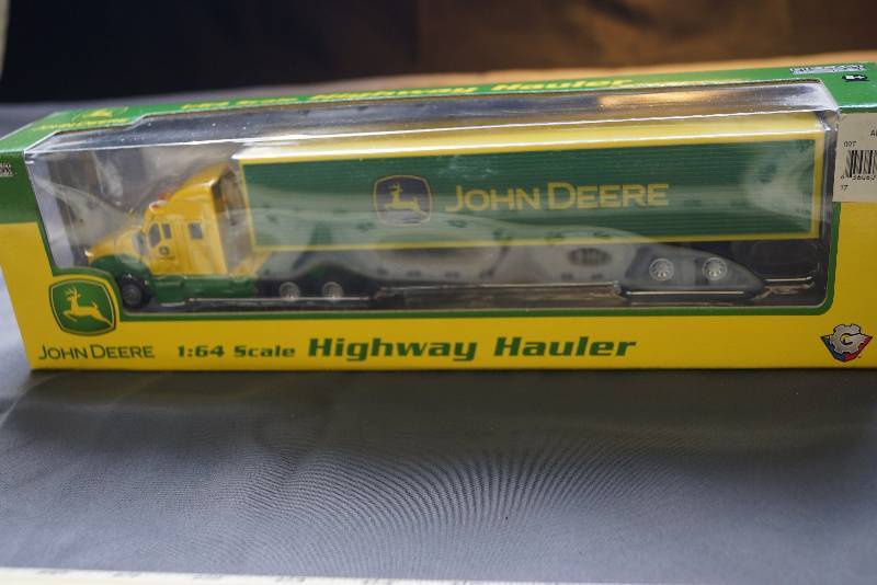 lot 83 image: 164 Scaled Boxed John Deere Highway Hauler  Trucker Set