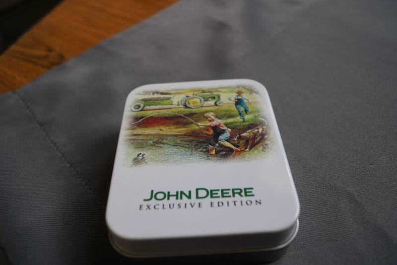 lot 84 image: John Deere Pocket Watch in Tin- Nice Piece