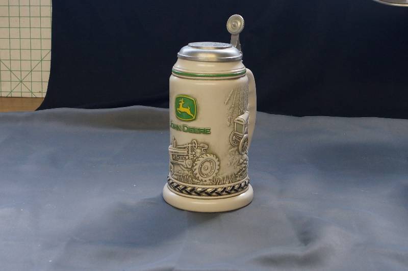 lot 91 image: John Deere Collectible Stein