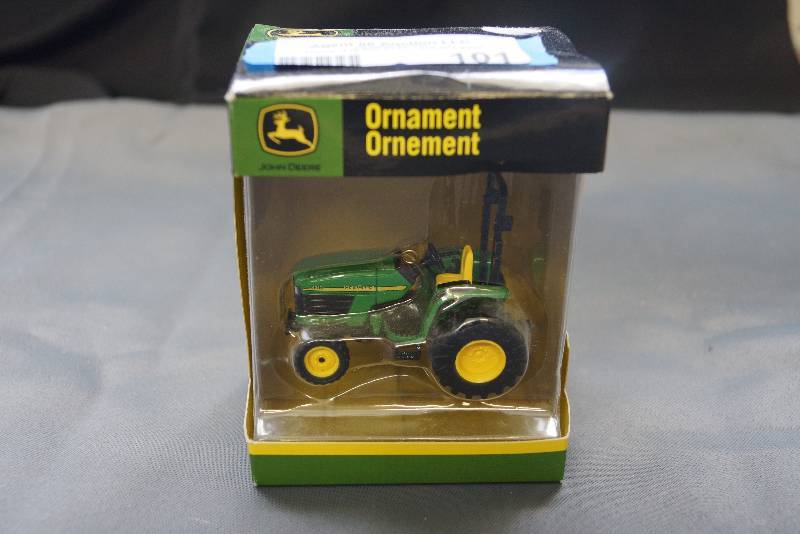 lot 101 image: John Deere Tractor Ornament- Boxed