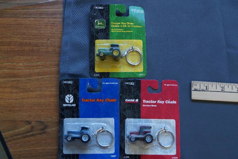 lot 210 image: Lot of 3 Tractor Key Chains
