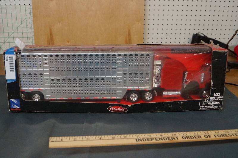 lot 1077 image: 132 Diecast- Long Hauler  OTR Truck and Trailer