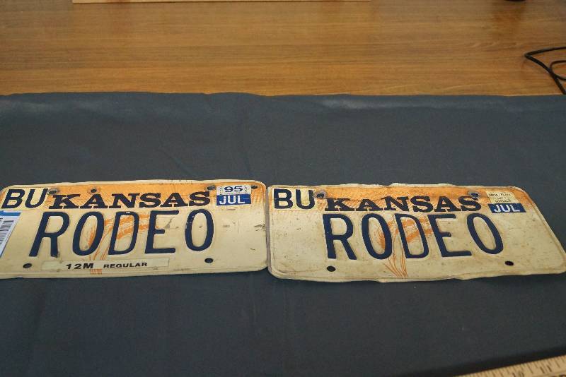 lot 1094 image: 2  Rodeo Kansas License Plates- Vanity