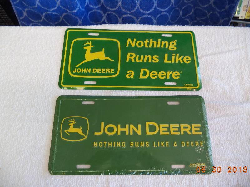 lot 1506 image: 2- John Deere License Plates