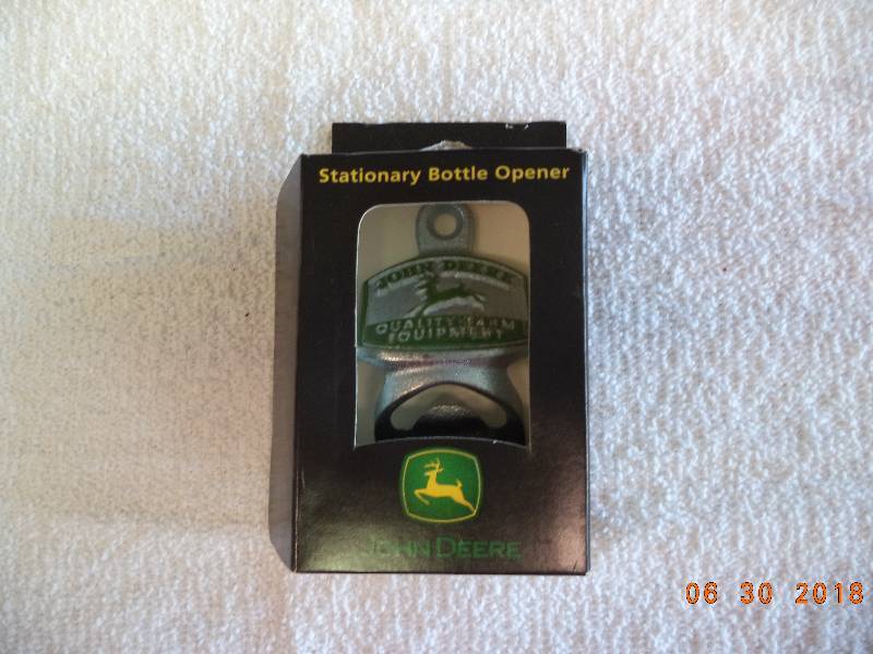 lot 1520 image: John Deere Bottle Opener- Stationary